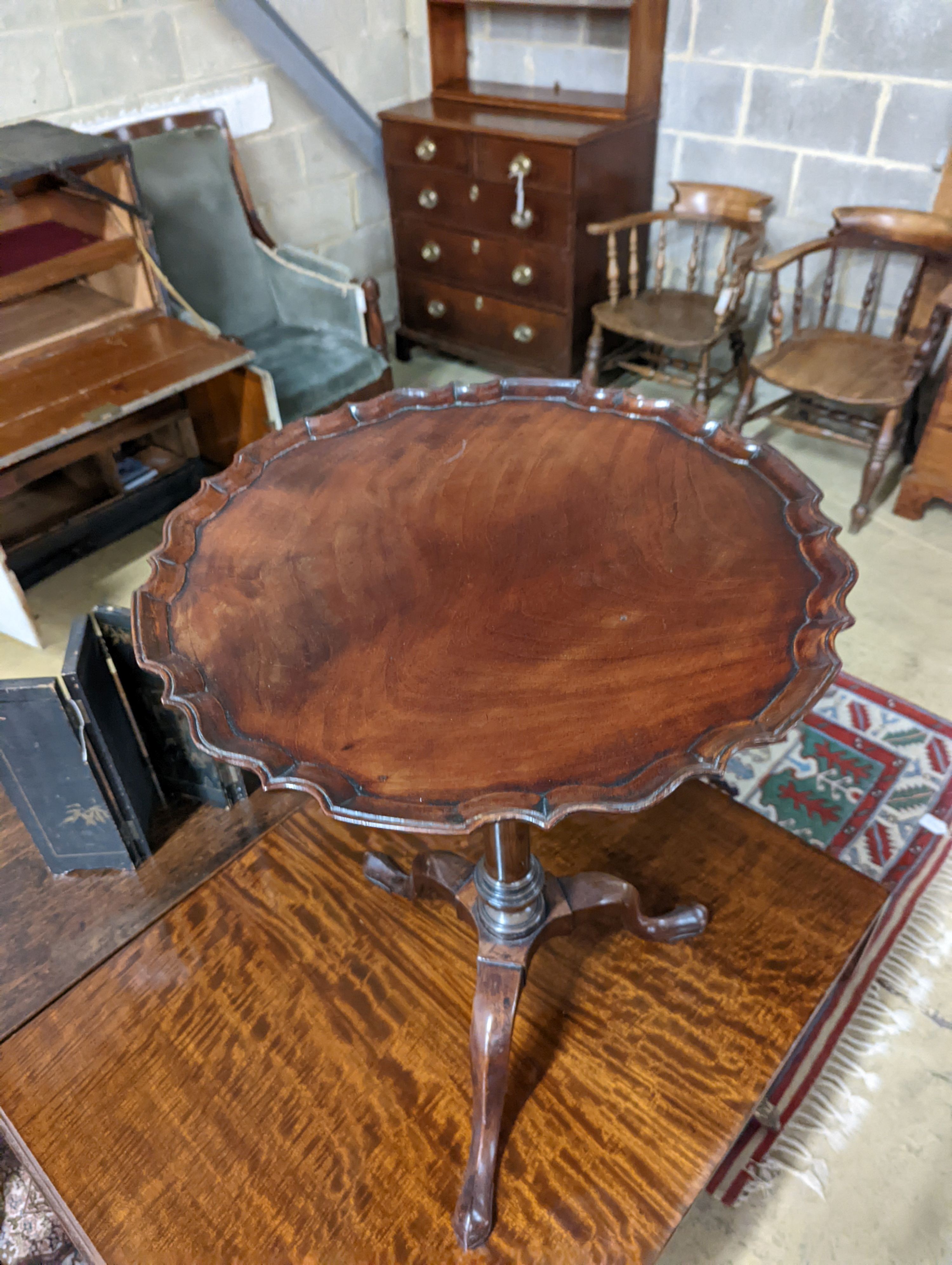 A George III and later mahogany Tripod Wine Table. Diameter - 49cm, Height - 67cm.